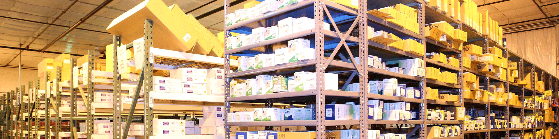 C&M Auto Parts warehouse shelves are stocked to the ceiling with car, truck and suv brake parts, filters, fans, belts, hoses, shocks, struts and wheel bearings.