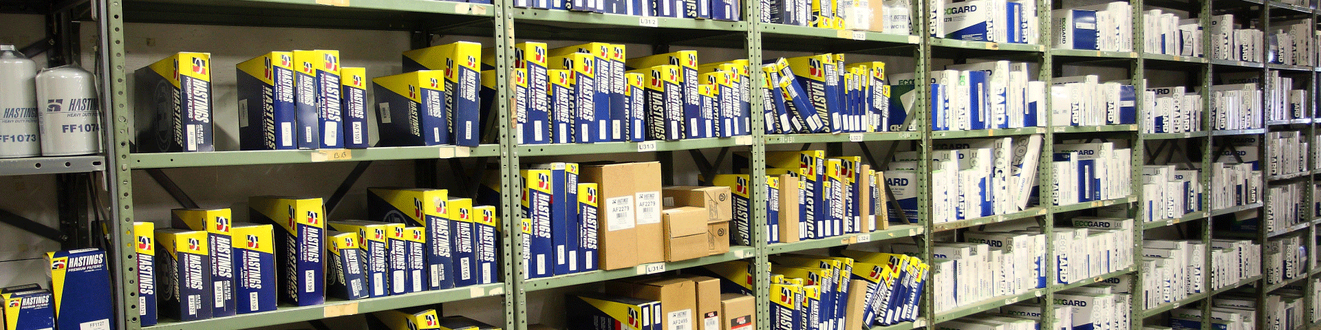 Shelves of auto parts, blue and yellow packaging. C&M Auto Parts Warehouses only stock the best names in auto parts, tools, hardware and accessories.